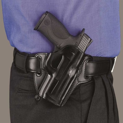 Concealable-holster tarjoaa mukautuvan muotoilun, erinomaisen pidon, nopean käyttömahdollisuuden ja kestäviä saumoja, mukautuu vyöhön jopa 1 1/2 tuumaa.