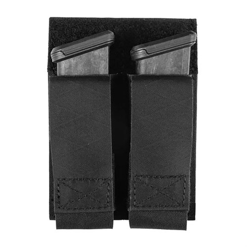 Grey Ghost Gearin Double Pistol Magazine Pouch pitää kaksi pistoolimakasiinia turvallisesti paikoillaan, kestävästä laminaattinylonista ja magneeteista.