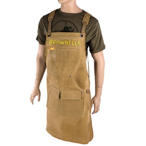 Brownells Premium Shop Apron on valmistettu vahapintaisesta kankaasta, jossa on useita taskuja, mukautettavat olkahihnat ja mukavuutta lisäävät pehmusteet.